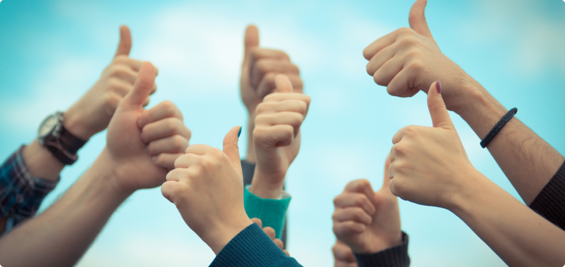 Group of hands giving a thumbs-up, symbolizing satisfaction and confidence in EG’s services.