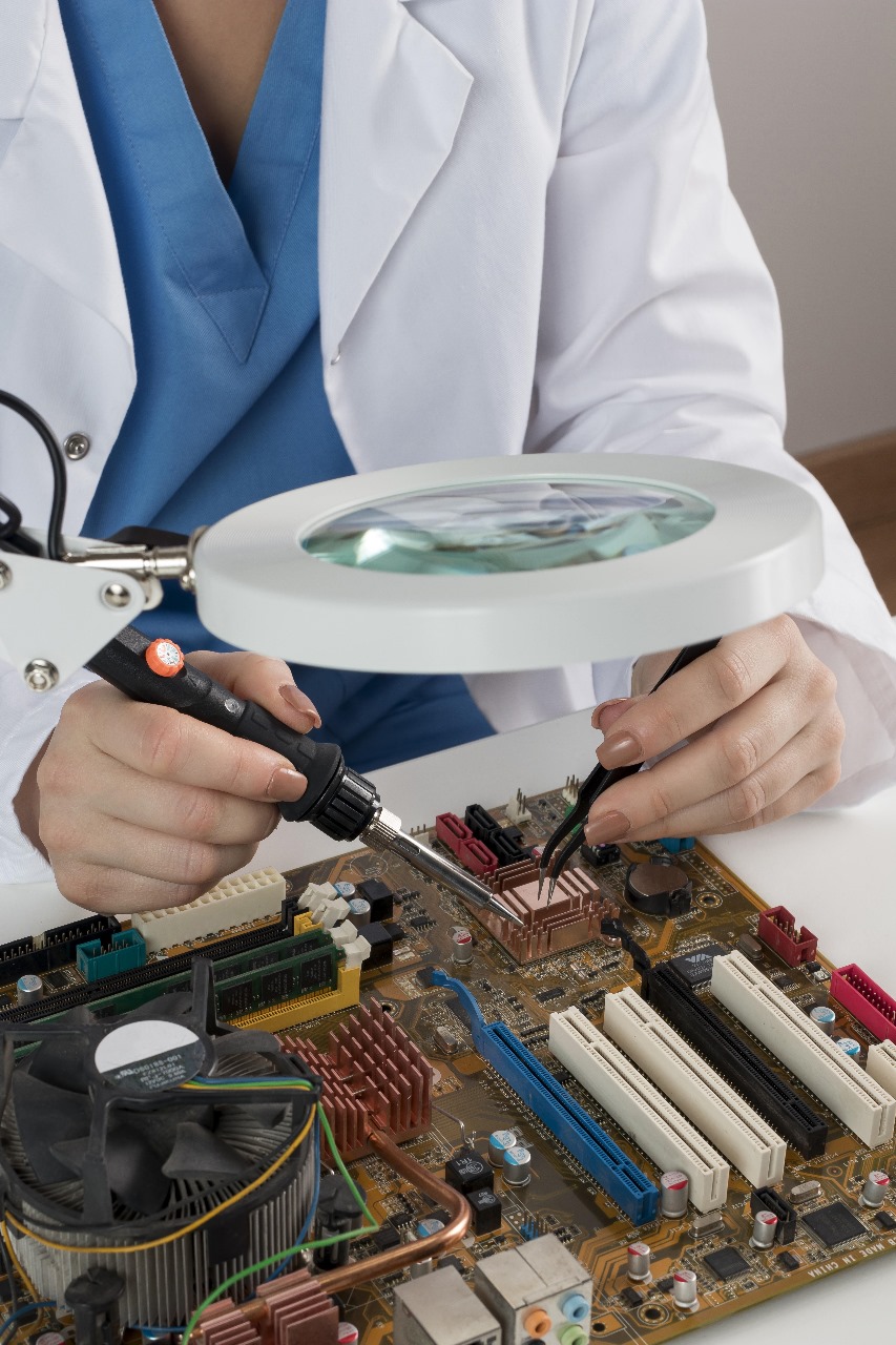 Medical team examining a patient using high-quality medical equipment supplied by EG.