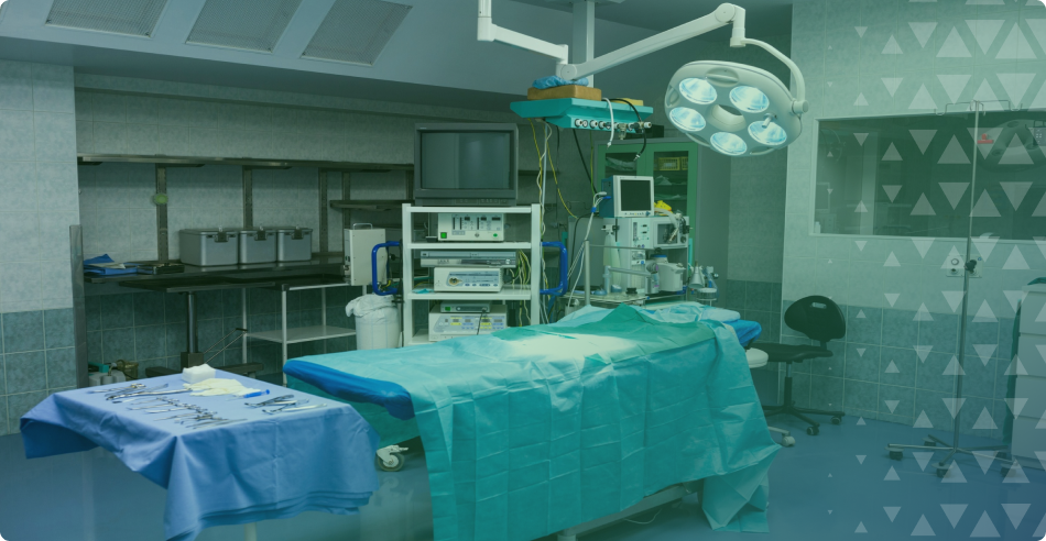 Fully equipped medical room with a state-of-the-art hospital bed and essential medical devices.